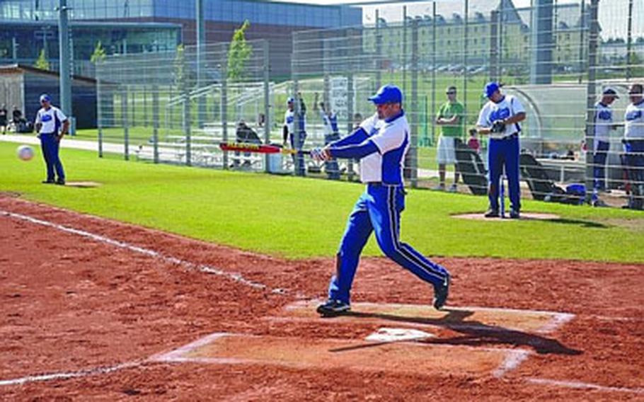 Jeff Martin of Grafenwoöhr hits a line drive during the first of three games Sunday at the U.S. Army Europe softball championship men’s tournament. Grafenwöhr won the title.