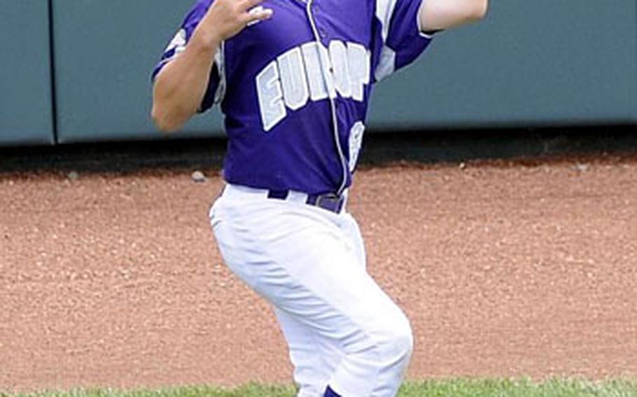 Ramstein AFB, Germany left fielder Cody Prince catches a ball hit by Reynosa, Mexico&#39;s Raul Rojas in the fourth inning of Little League World Series baseball pool play in South Williamsport, Pa., Monday.