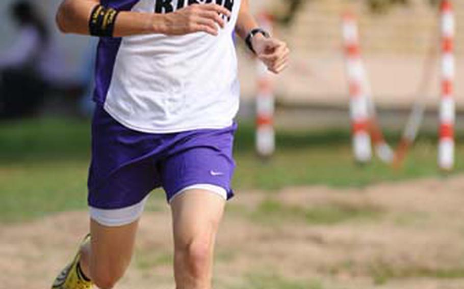 Mannheim's Alex Cornelius heads towards the finish line to win the season opening boys' cross country race in Wiesbaden, Germany, on Saturday. He won in 18:18 ahead of Wiesbaden's David Reynolds.
