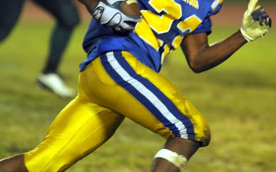 Yokota running back Gerald McCloud turns the corner on a 35-yard, third quarter touchdown run.