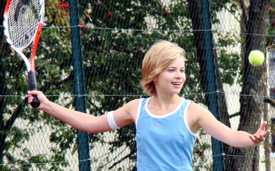 Sophomore Kaitlyn Miller readies a forehand during a recent practice session at Bitburg High School.