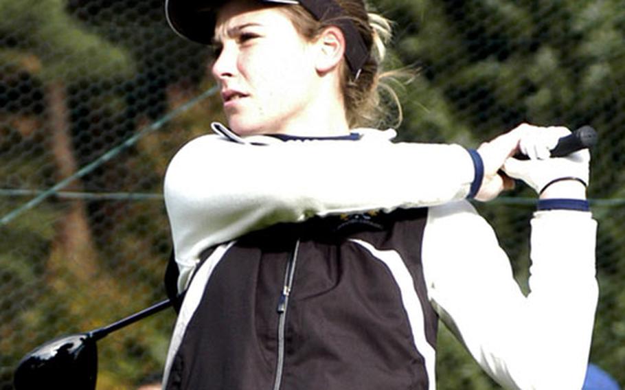 Hollie Salvo, a sophomore from Wiesbaden, watches her opening drive of the 2009 DODDS-Europe golf tournament at Rheinblick Golf Course in Wiesbaden, Germany.