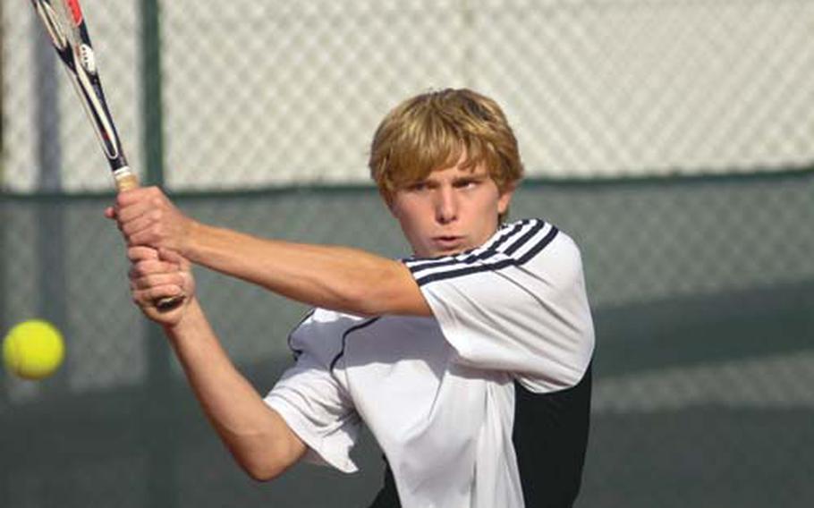 James Chase, a junior from Heidelberg, Germany, returns a shot to Jon Lightner of Patch on Saturday in their Region III match at Heidelberg. Chase defeated Lightner 6-1, 6-1.