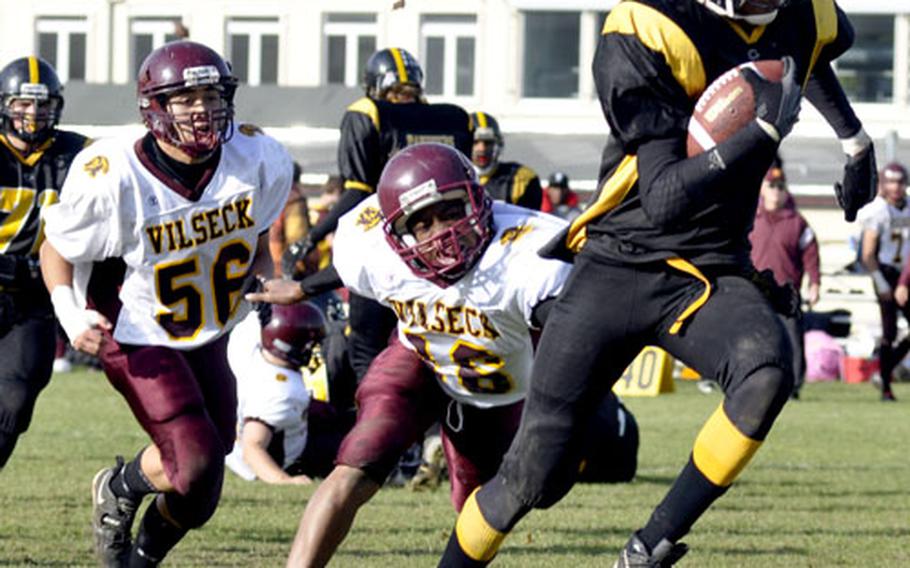 Patch&#39;s Julius Johnson-Rich runs for a fourth-quarter touchdown during the Panthers&#39; 47-14 loss to Vilseck on Saturday.