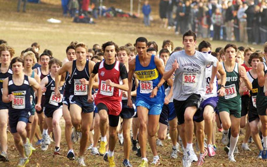 Fort Baudoin of the International School of Brussels, center, in red, sprints out of the pack of 167 boys Saturday in the DODDS-Europe cross country championships in Schwetzingen, Germany. Fort won the race in 16 minutes, 29 seconds after coming in second in 2008.