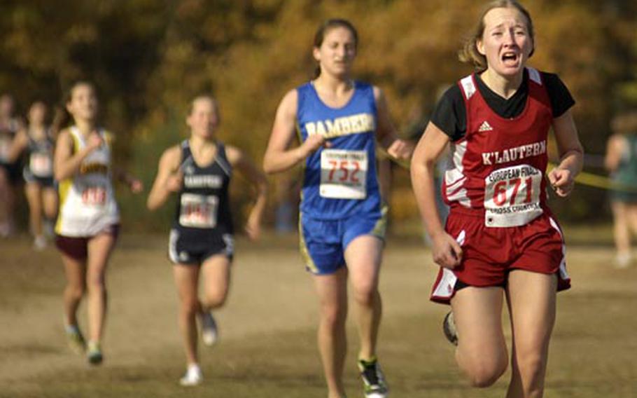 Colleen Davis from Kaiserslautern High School, sprints towards the finish line during the girls DoDDS European cross country championship held in Schwetzingen near Heidlelberg, Germany. Katherine Castro of Patch clinched the overall win with Davis taking second and Sydney Schneider of Bamberg in third.