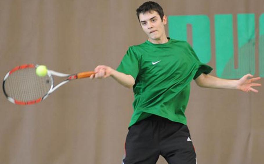 SHAPE’s Nikolay Gospodinov returns a shot by Heidelberg’s James Chase on his way to winning the DODDS-Europe boys singles championship Saturday with a 7-6 (7-3), 3-6, 6-2 victory.