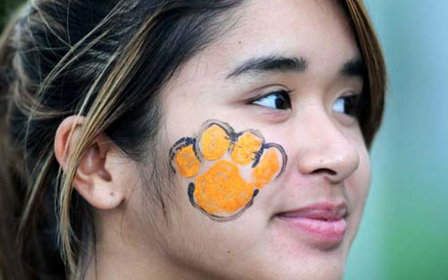 Kadena Panthers senior Brittany Rosario displays her spirit facepainted paw print.