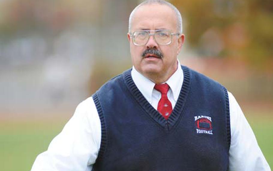 Bitburg coach Mike Laue paces the sidelines, watching his team, during a game in October. Laue turned an 0-2 team into a champion and was voted the DODDS-Europe football coach of the year.