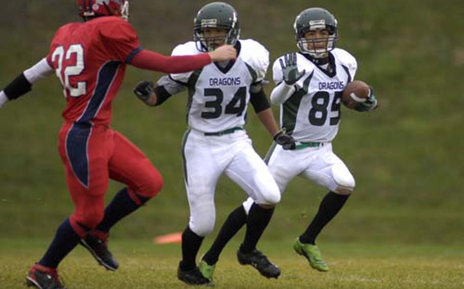 Alconbury senior Devin Pryor rushes against Menwith Hill Saturday during the DODDS-Europe Division III football championship at Baumholder. Pryor, the top rusher in DODDS-Europe, was named to the all-Europe football team at running back.