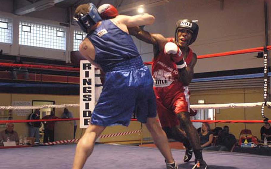 Frank Horsey, 27, from Kaiserslautern, lands a right hand on Anthony Jones, 30, from Lajes, during a U.S. Forces Europe championship bout at Miesau, Germany, in April. Horsey defeated Jones in the second round when the referee stopped the fight. It was the only championship decided in the ring. The other five titles were decided by walkover or absence of opponents.