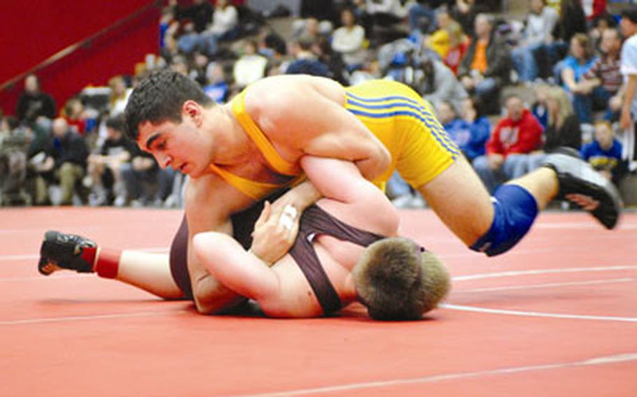 Ansbach’s Dominic Barrale locks up Baumholder’s Trent Carbaugh during their 189-pound match on Jan. 16 at Kaiserslautern High School. Barrale, who pinned Carbaugh, will be aiming for his third DODDS-Europe title in his third weight class in the DODDS-Europe wrestling tournament this weekend.