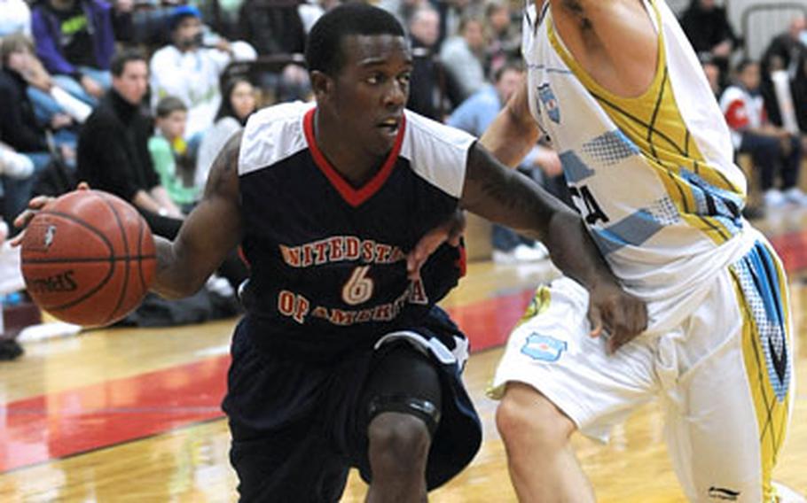 Farooq Muhammad of the United States looks to pass to a teammate as he drives against Argentina&#39;s German Abel Ressia. The U.S. beat Argentina 61-53 Monday night to stay alive at the Albert Schweitzer tournament in Mannheim, Germany.