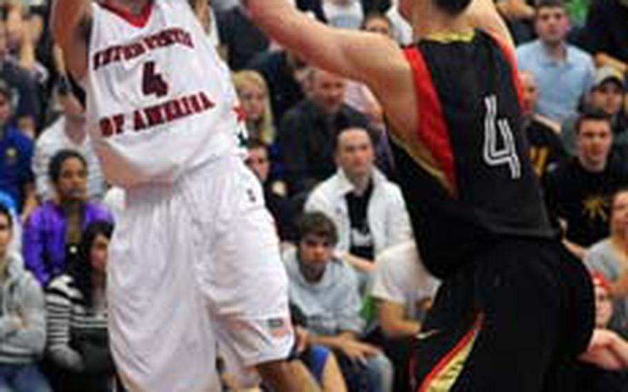 The United States&#39; Dillon Wadsack, a senior at Ramstein High School, looks to pass to an open teammate as Germany&#39;s Anselm Hartmann defends. The U.S. lost to Germany&#39;s Under-17 team 79-68 in the third place game of the Albert Schweitzer International Youth tournament in Mannheim, Germany, on Saturday.