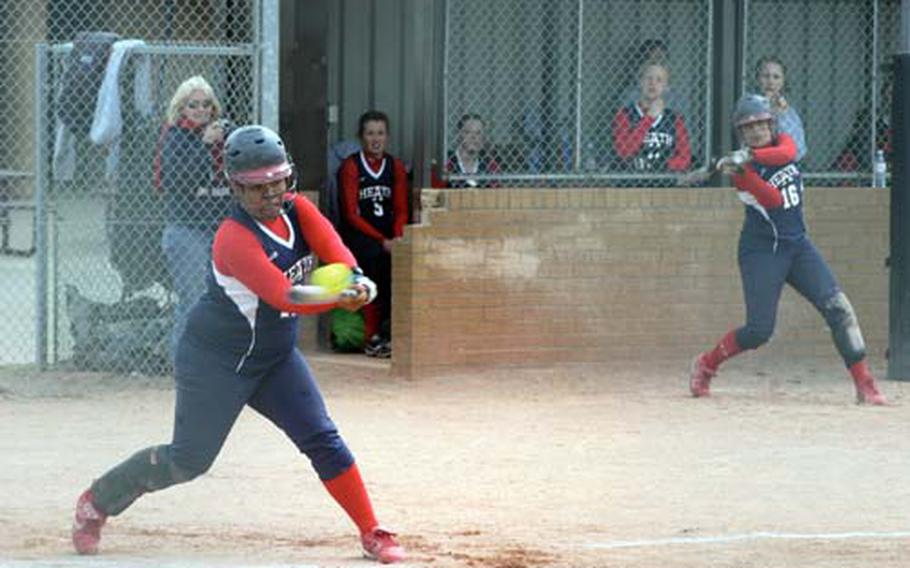 Lakenheath’s Mikel Johnson connects during the second game of a doubleheader against Alconbury at RAF Lakenheath on Saturday. The Lady Lancers swept the visitors 18-1 and 24-2.