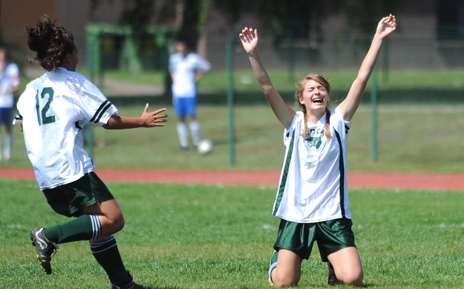 Sofia Cianciaruso of Naples sinks to her knees as she celebrates her title-winning 3-2 free kick as teammate Ashley Willey rushes in to congratulate her. Cianciaruso earlier scored the game-tying 2-2 goal in the Division II championship game against AFNORTH.