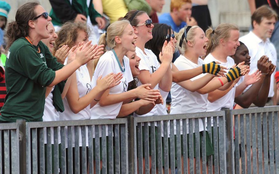 The Ankara girls team cheer their boys after the Trojans beat Alconbury 4-2 for the Division III title in the DODDS-Europe soccer tournament.