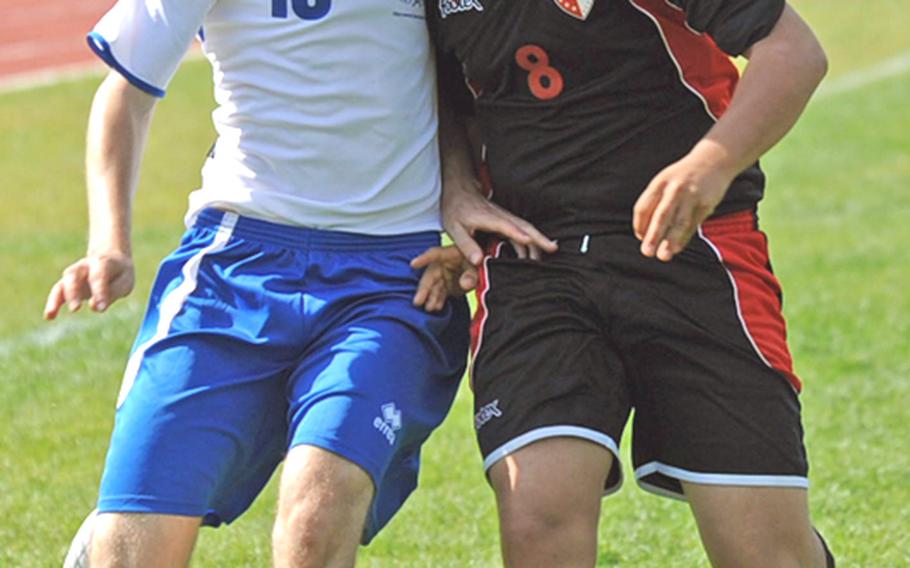 Marymount&#39;s Paolo Muir, left, and American Overseas School of Rome&#39;s Elliot Epstein fight for the ball in the Division II title game at the DODDS-Europe soccer championships in Ramstein, Germany, on Saturday. No. 2  AOSR defeated top-seeded Marymount, 2-1.
