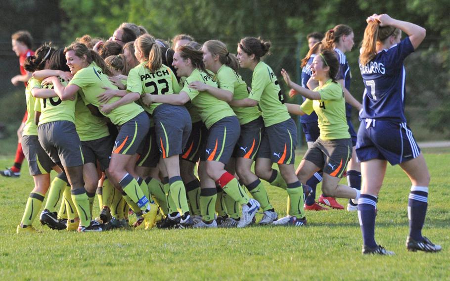 The Patch Lady Panthers celebrate their 2-1 overtime win against Heidelberg in the Division I final at the DODDS-Europe soccer finals in Ramstein on Saturday. Nelly Loney scored the winning goal