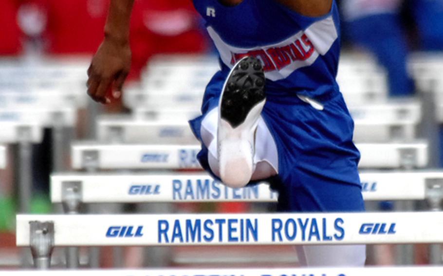 Ramstein&#39;s Dimitri Mobley clears a hurdle on his way to winning the 110-meter race during a track meet earlier this year in Ramstein. Mobley also runs the 300 meter hurdles, and is the only person this year to break the 40-second mark in that event.