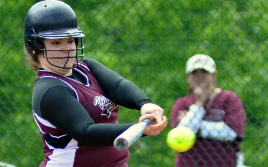 Vilseck catcher Veronica Lopez lines a single to drive in two runs against Heidelberg on the first day of the DODDS-Europe Division I softball championship on Thursday at Ramstein Air Base, Germany. Vilseck won 8-5.