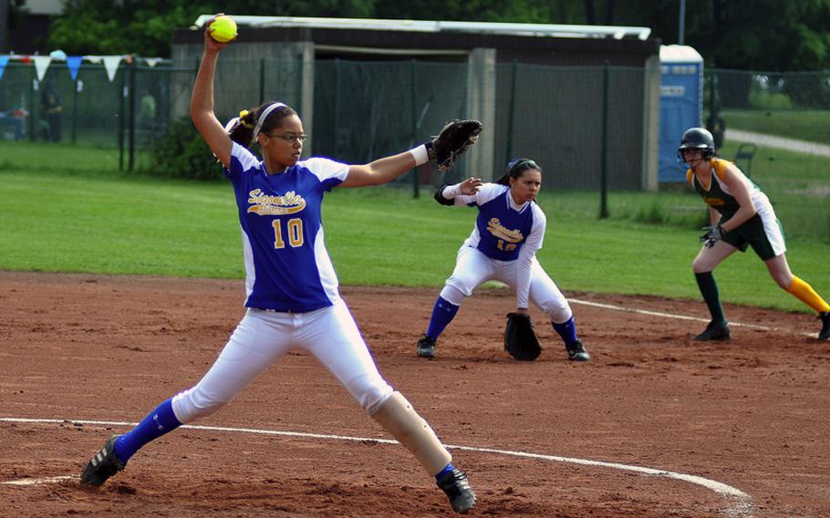 Sigonella pitcher Mekayla Valentine fires a pitch as Alconbury's Ashley Steele takes off on a successful steal attempt during the DODDS-Europe Division III softball game on Friday at Ramstein Air Base, Germany. Top-seeded Sigonella beat No. 2 seed Alconbury 14-11.