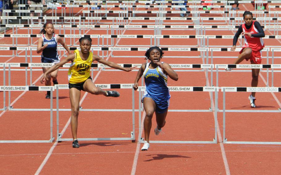 Tiffany Heard of Ansbach High wins her second gold medal of the DODDS-Europe Track and Field Champions by taking the girls 100 meter hurdles in DODDS-Europe record time of 14.81 seconds. Second was Shy Kimeyun Alexander of Patch at 15.23, and third was Tatjana Gainey of Kaiserslautern at 17.35.