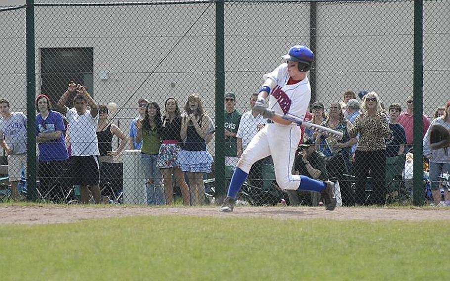 Ramstein sophomore Shane Foley shows off his power as he launches a solo home run in the final inning of Saturday&#39;s European Division I high school baseball championship game at Ramstein Air Base. After getting off to a strong lead, the defending champions fell to Patch 10-9.