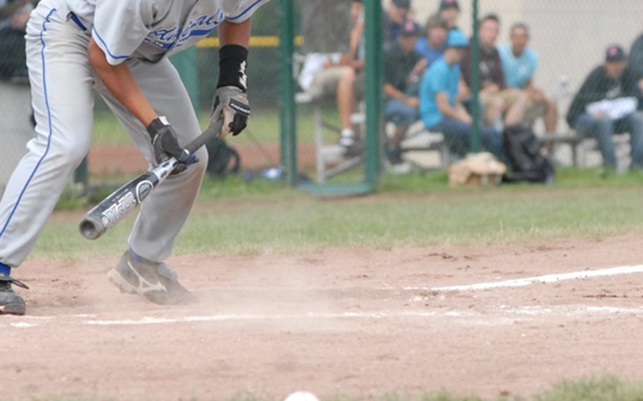 Rota senior Alan Genido fouls a bunt attempt during the DII/III championship game of the European high school baseball championships on Saturday.