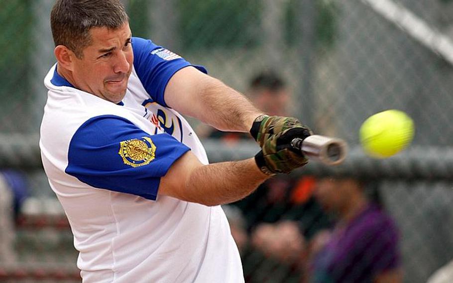 Former All-Air Force infielder Gary Lafon takes his cuts on a Scrapalators pitch during Monday&#39;s men&#39;s championship game in the 20th Pacificwide Open Interservice Softball Tournament at Field 1, Lombardo Field FourPlex, South Post, Yongsan Garrison, South Korea. Legion repeated its title, beating Scrapalators 26-13 in five innings.