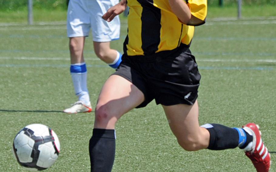 Patch's Alysia Verones drives the ball upfield in a girls Division I semifinal game at the DODDS-Europe soccer finals in May. Verones was one of three Patch players selected to the 2010 All-Europe girls team.