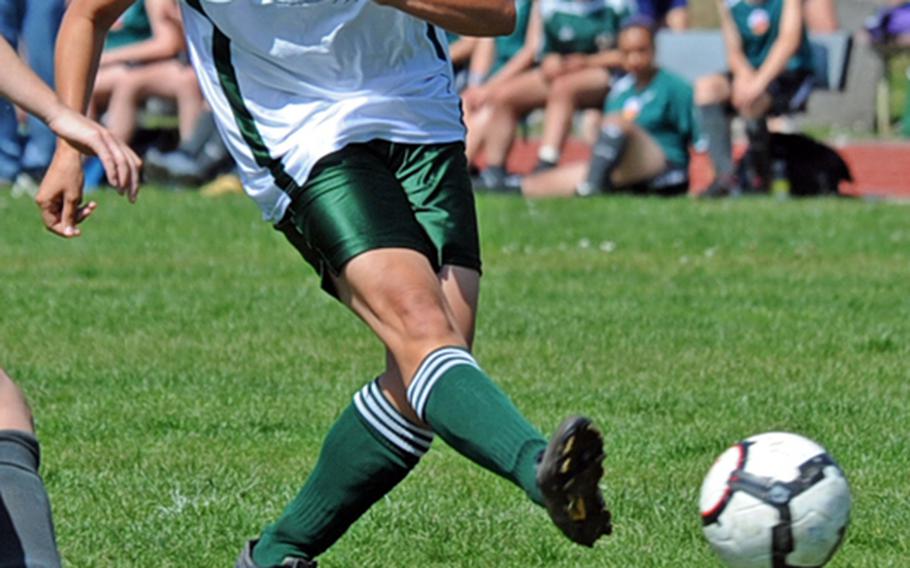 Demi Holbrook of Naples shoots on goal against AFNORTH in the DODDS-Europe Division II soccer final in May. Holbrook was chosen for the 2010 All-Europe soccer squad.