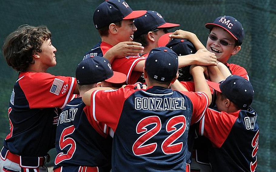 The KMC Little League All-Stars celebrate their victory over North Rhine-Westphalia in the second game of a Germany playoff series, 3-2, in Ramstein, Germany, on Saturday. The All-Stars will now go to Kutno, Poland, for a chance to win a trip to the Little League World Series in Williamsport,  Pa.