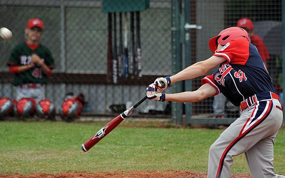 Mackenzie Mueller connects for a game-tying solo home run in the KMC Little League All-Stars&#39; 3-2 win over North Rhine-Westphalia in the second game of a Germany playoff series in Ramstein, Germany, on Saturday. The KMC team qualified for the Little League Europe regional tourney in Kutno, Poland, and a chance to go to the Little League World Series in Williamsport, Pa.