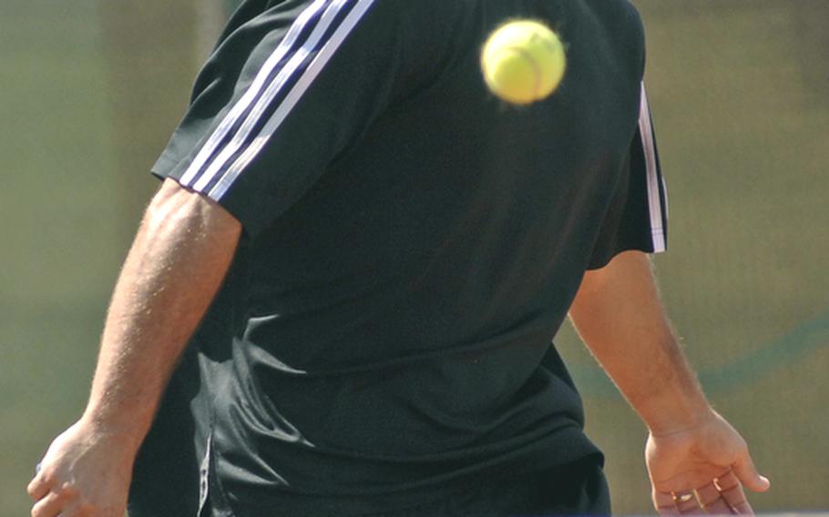 Ralph Totorica watches his return sail over the net in his 6-2, 3-6, 1-6 loss to Metin Karaca in the masters division final at the U.S. Forces Europe tennis championships in Heidelberg, Germany, on Sunday.