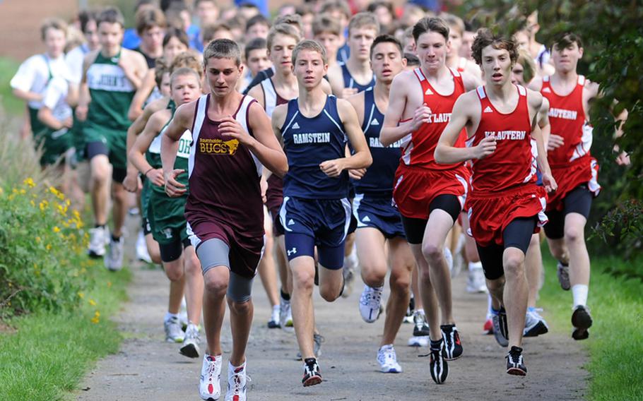 A pack of runners helps get the DODDS-Europe fall sports season underway with a cross country meet at Ramstein-Miesenbach. Runners from Ramstein, Baumholder, Kaiserslautern and St. John’s International School of Belgium competed.