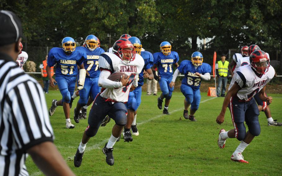 Aviano junior Darien Cornett breaks free of the Bamberg defense for a nice pickup Saturday in Schweinfurt during Bamberg&#39;s 26-20 opening-day victory.