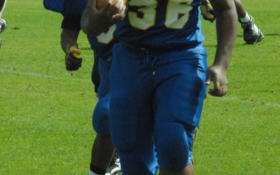 Bamberg freshman Wally Garcia makes his way down field for a good gain Saturday in Schweinfurt, Germany, during Bamberg&#39;s season-opening 26-20 victory over visiting Aviano.