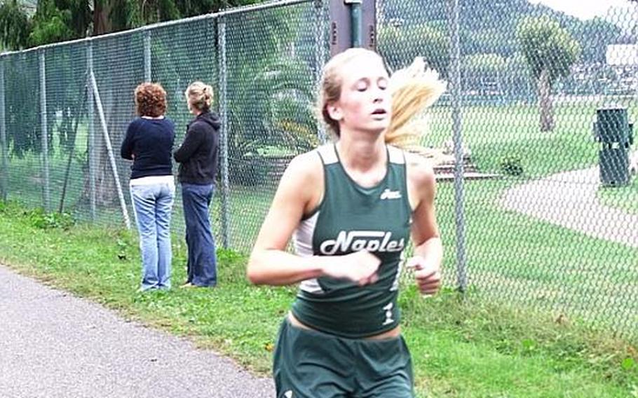 Ryan Murphy of Naples High School finishes third for the girls team at Saturday's cross country meet against Sigonella. She finished in 24 minutes, 50 seconds, third behind teammates Amber Sheline and Katey Chartier.