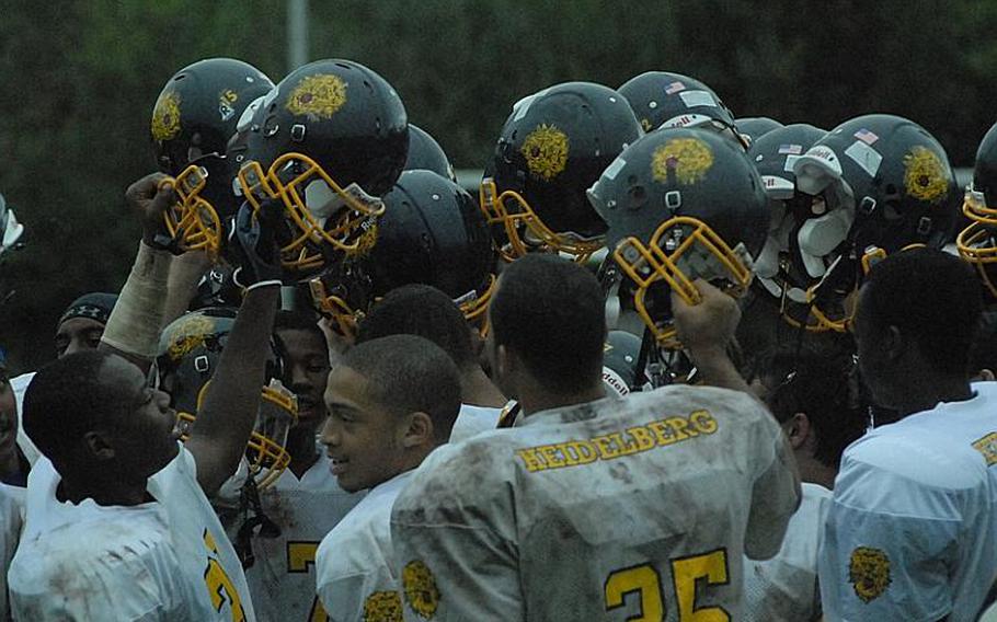 The Heidelberg Lions celebrate following a 14-0 win over Vilseck Saturday, which gave them first place after two games of play in Division I-South.