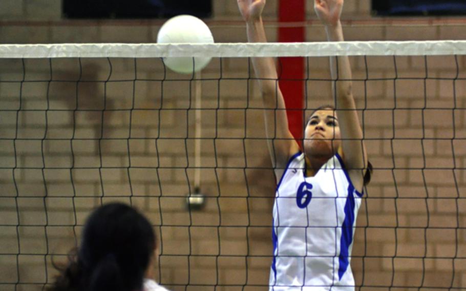 Rota's Michaela Texidor attempts to block a shot from a Menwith Hill player. The Rota Admirals defeated the Mustangs Oct. 2 at RAF Alconbury, England.