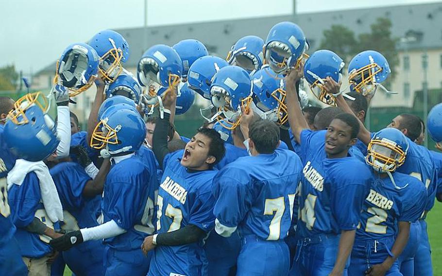 The Bamberg Barons celebrate their come-from-behind victory Saturday against visiting Naples. Bamberg scored 26 unanswered points for a 26-21 win  to remain undefeated in Division II-South.