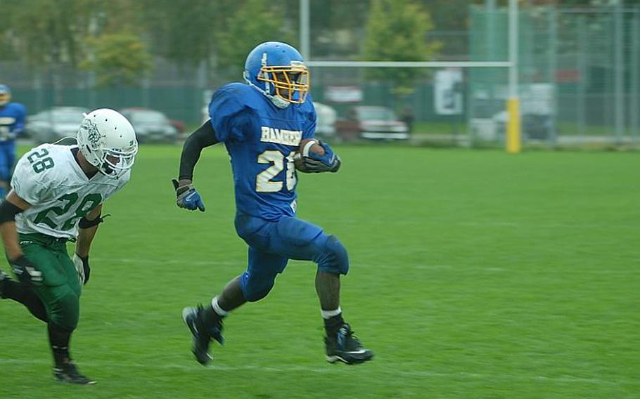 Bamberg senior running back Javonte Knuckles heads for the sideline to stop the clock on Bamberg's game-winning drive late in the fourth quarter against Naples. Knuckles rushed for 305 yards on 20 carries and scored two touchdowns as Bamberg remained undefeated in Division II-South.