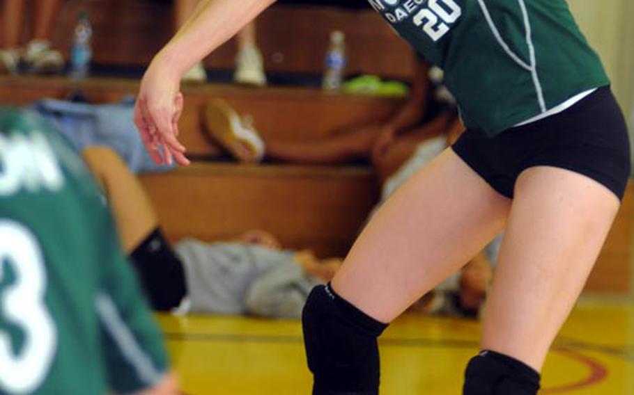 Kristina Bergman of Daegu American receives a Kubasaki serve during Saturday's matches in the 1st Kadena Invitational Girls Volleyball Tournament at Panther Pit, Kadena High School, Kadena Air Base, Okinawa. Defending Far East Division II Tournament champion Daegu lost to Kubasaki 22-25, 25-9, 15-12, then lost to Shuri Higashi 25-13, 14-25, 15-12 before sweeping Okinawa Christian International 25-13, 25-10 to go 3-3 after two days of play in the three-day tournament. Shuri Higashi was 6-0 and Kubasaki 3-2.