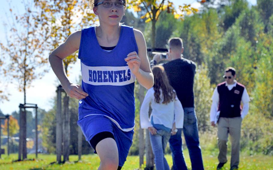 Running a personal best time of 21 minutes, 24 seconds, freshman Amanda Elliott of Hohenfels captures the girls' cross country race Saturday at Bamberg.
