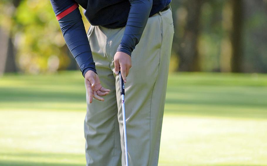 Ramstein&#39;s Jordan Linder watches his putt roll towards the cup on opening day of the DODDS-Europe golf championships at Wiesbaden&#39;s Rheinblick golf course on Thursday.