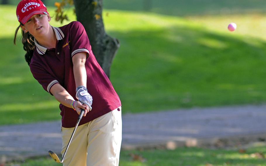 Vilseck&#39;s Katie Cooper hits out of the rough on opening day of the DODDS-Europe golf championships at Wiesbaden&#39;s Rheinblick golf course on Thursday.