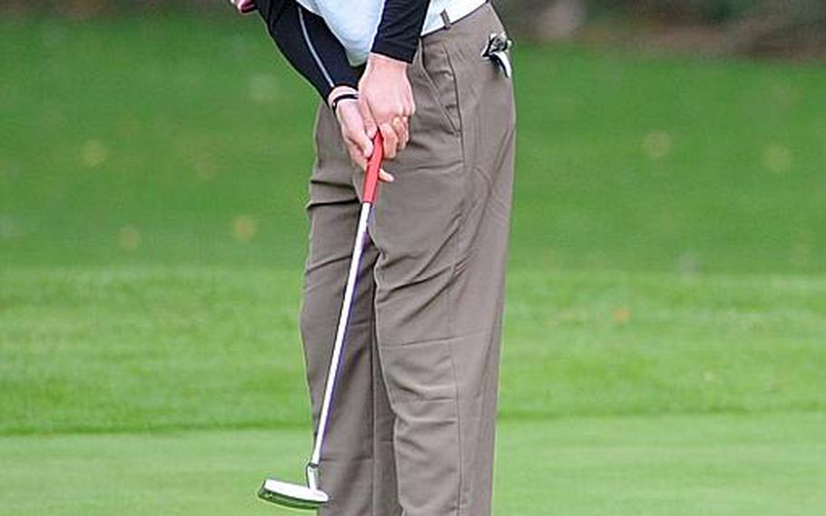 Kaiserslautern's Caleb Hayes watches his putt roll towards the cup on the final day of the 2010 DODDS-Europe golf championships in Wiesbaden, on Friday. Hayes finished second behind teammate Mackenzie Bradley.
