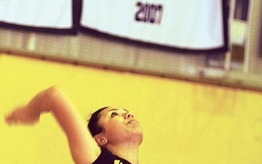 Kadena Panthers' Chantal Myers prepares to serve the ball against Okinawa Christian International during Tuesday's Okinawa Activities Council girls volleyball match at Panther Pit, Kadena High School, Kadena Air Base, Okinawa. The Panthers beat the Crusaders in four sets, 25-14, 22-25, 25-10, 25-19.