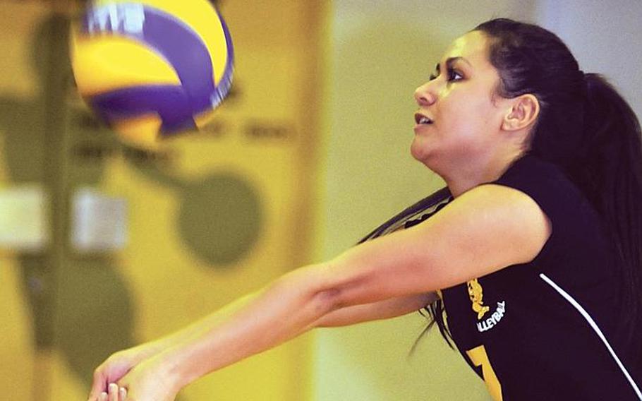 Kadena Panthers' Chantal Myers camps under an Okinawa Christian International serve during Tuesday's Okinawa Activities Council girls volleyball match at Panther Pit, Kadena High School, Kadena Air Base, Okinawa. The Panthers beat the Crusaders in four sets, 25-14, 22-25, 25-10, 25-19.